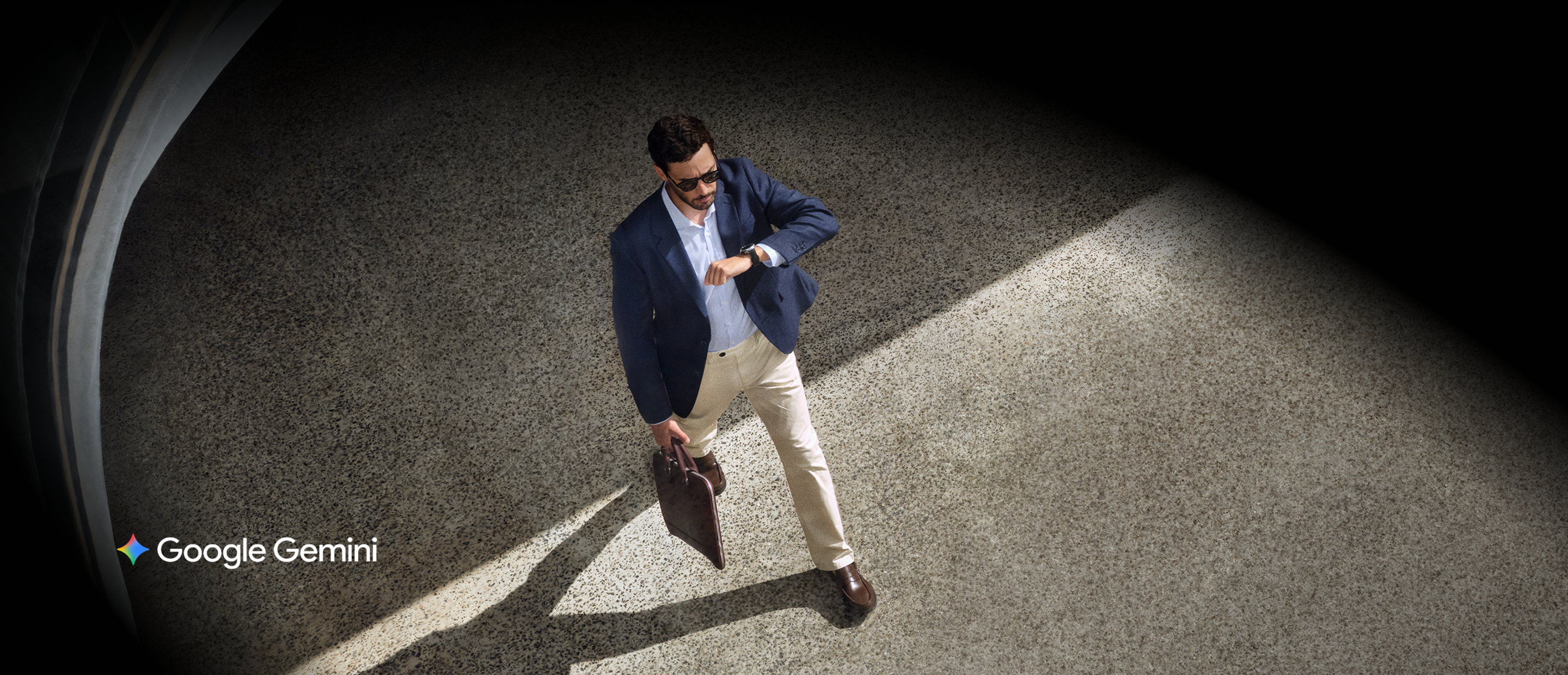 Image of a business man looking at his watch on the go
