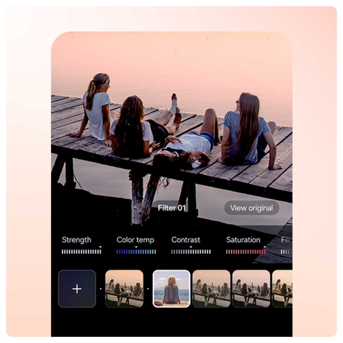 A group of girls sitting and lying on a wooden deck